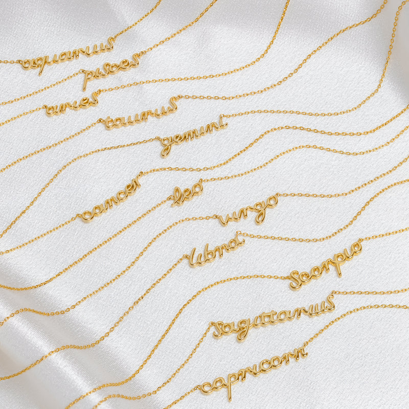GOLD ZODIAC SCRIPT NECKLACE